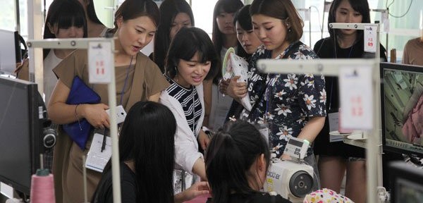 广州市白云工商技师学院服装系接待韩国代表团-广东技校排名网